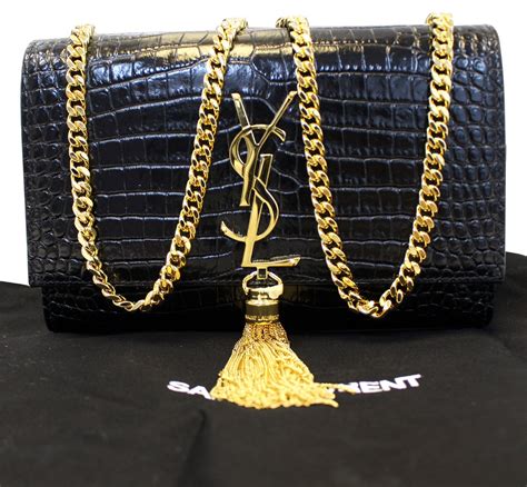 small black ysl bag with gold chain|YSL black purse with chain.